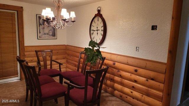 201 South Greenfield Road, Unit 331 Mesa, AZ 85206 - Photo 24 of 49 a view of a dining room with furniture and a chandelier