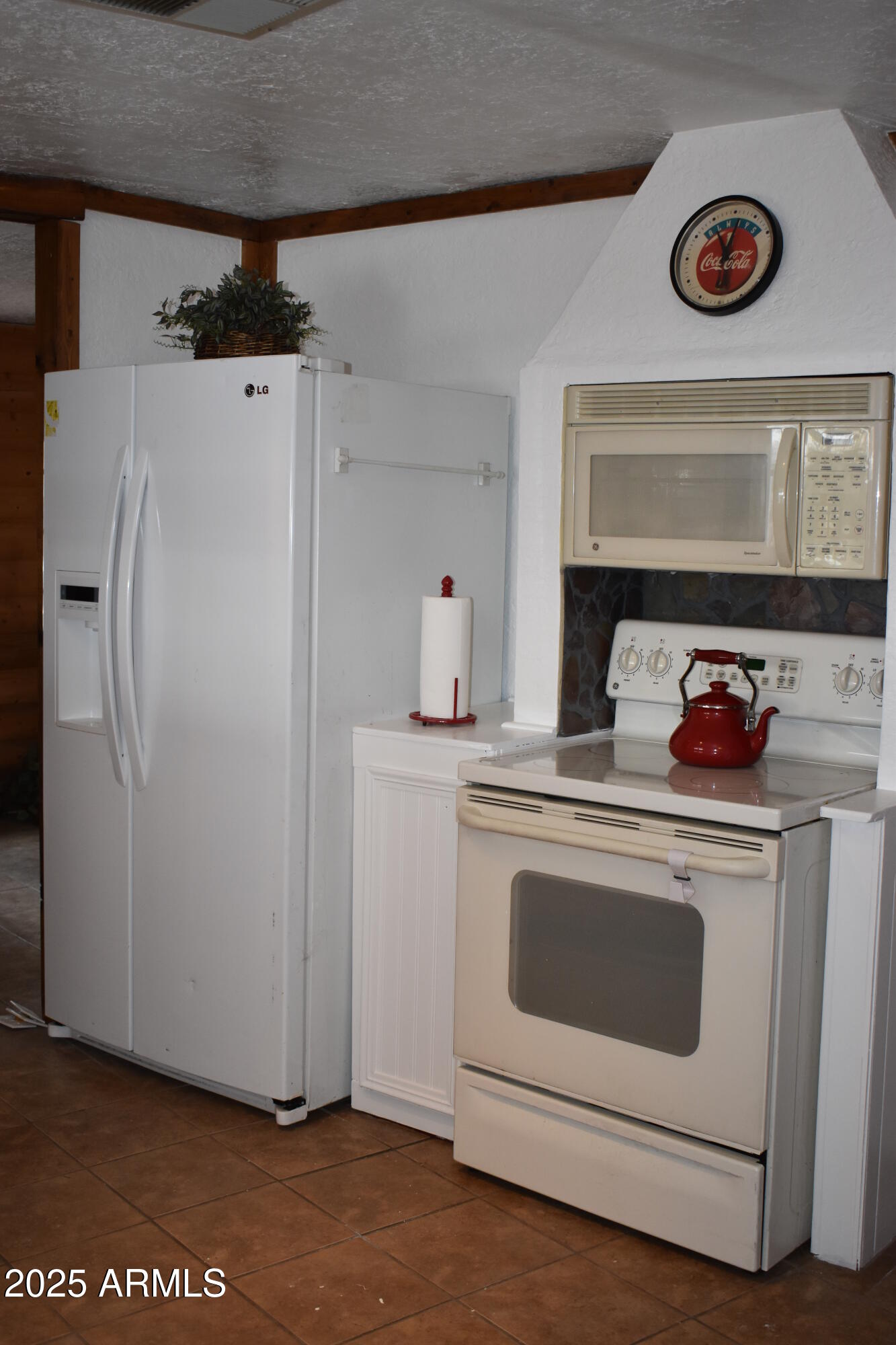 201 South Greenfield Road, Unit 331 Mesa, AZ 85206 - Photo 28 of 49 a white stove top oven sitting inside of a kitchen