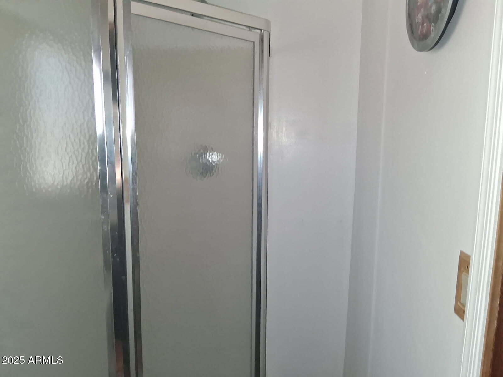 201 South Greenfield Road, Unit 331 Mesa, AZ 85206 - Photo 41 of 49 a bathroom with a glass shower door