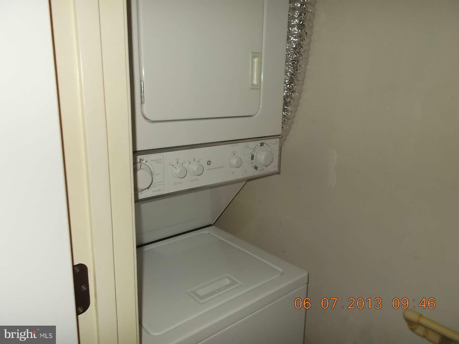 14913 Cleese Court, Unit C Silver Spring, MD 20906 - Photo 12 of 20 a utility room with dryer and washer