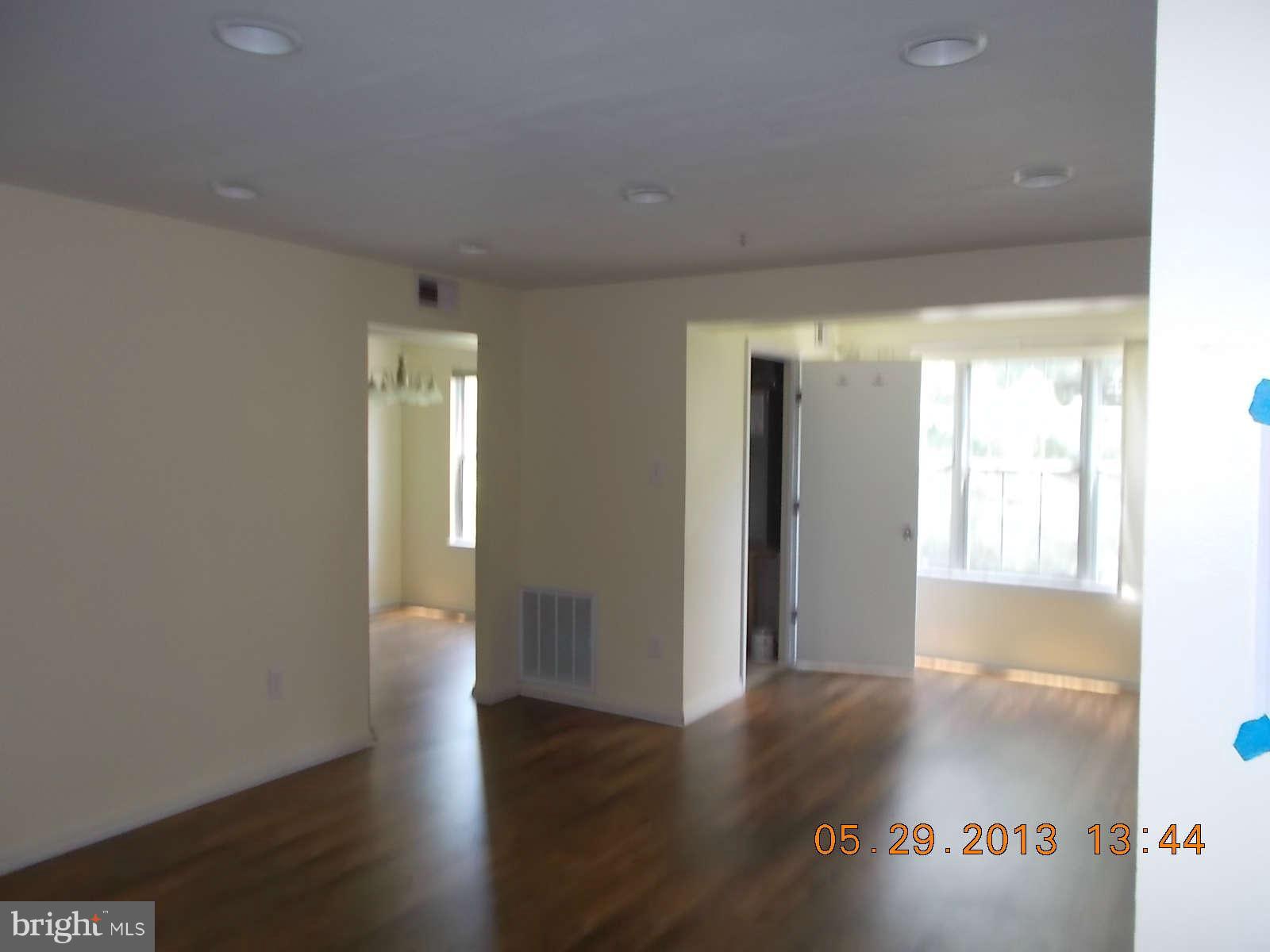 14913 Cleese Court, Unit C Silver Spring, MD 20906 - Photo 7 of 20 a view of hallway with wooden floor