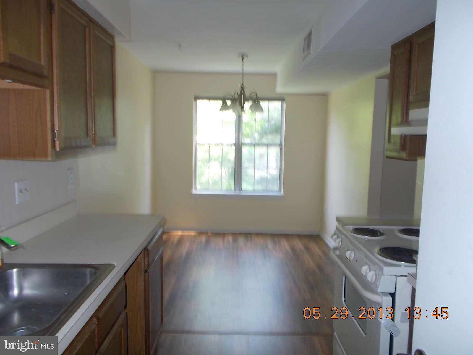 14913 Cleese Court, Unit C Silver Spring, MD 20906 - Photo 10 of 20 a view of livingroom with furniture and window