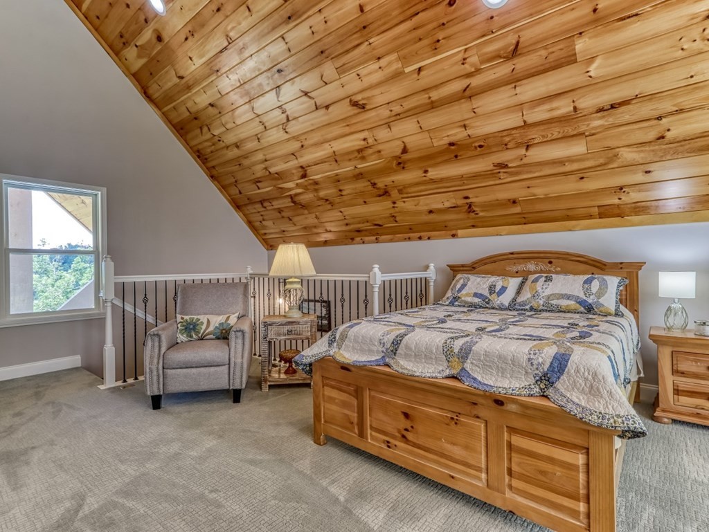 1979 Timber Ridge Way Sevierville, TN 37876 - Photo 26 of 39 a bedroom with furniture and a window