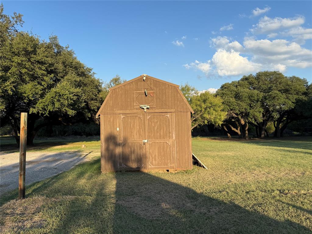 401 Highway 2247 Comanche, TX 76442 - Photo 15 of 19 a view of a yard with basketball court
