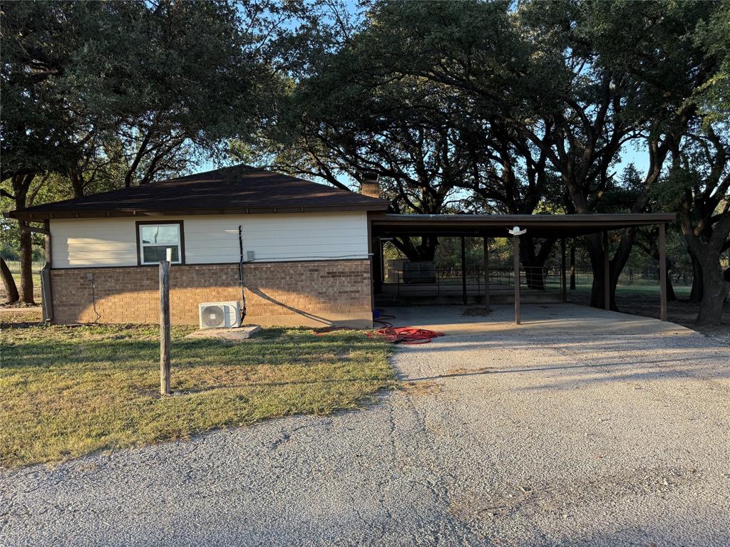 401 Highway 2247 Comanche, TX 76442 - Photo 16 of 19 a view of a house with a yard