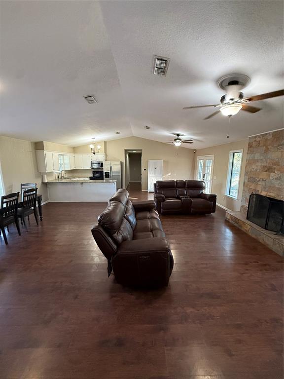 401 Highway 2247 Comanche, TX 76442 - Photo 3 of 19 a living room with furniture and a fireplace