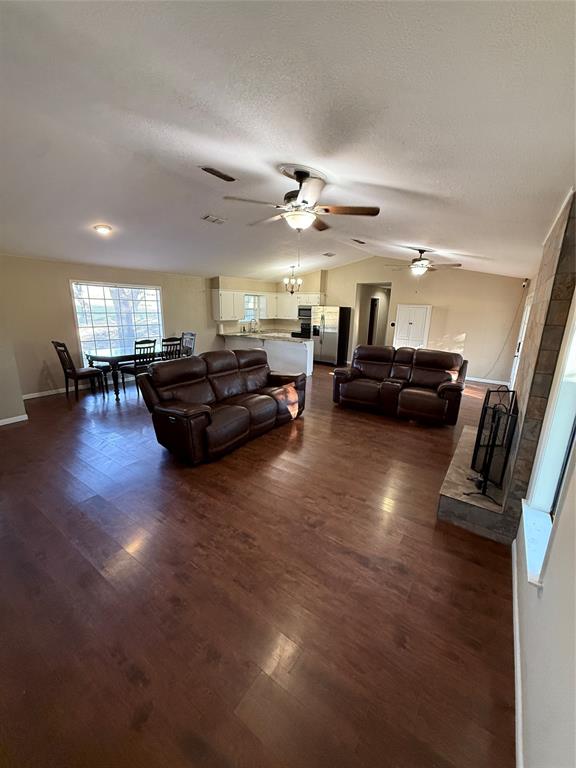 401 Highway 2247 Comanche, TX 76442 - Photo 4 of 19 a living room with furniture and a wooden floor
