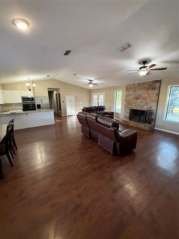 401 Highway 2247 Comanche, TX 76442 - Photo 5 of 19 a living room with furniture and a fireplace