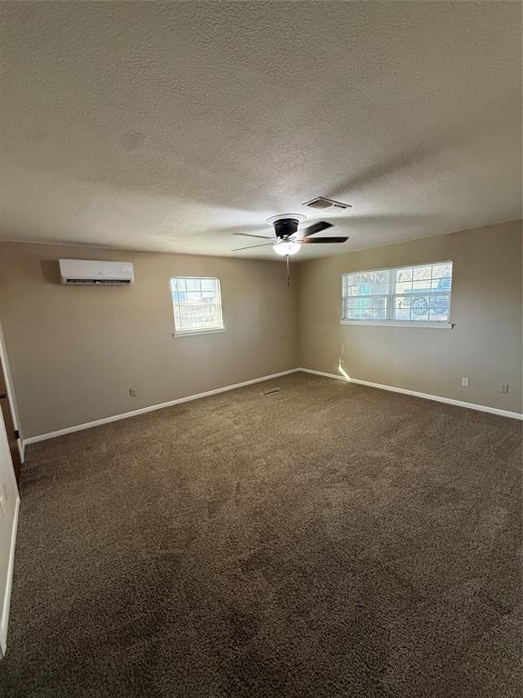 401 Highway 2247 Comanche, TX 76442 - Photo 8 of 19 a view of an empty room with a window