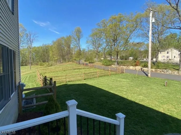 a view of a golf course with a lake