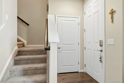 a view of an entryway with hallway