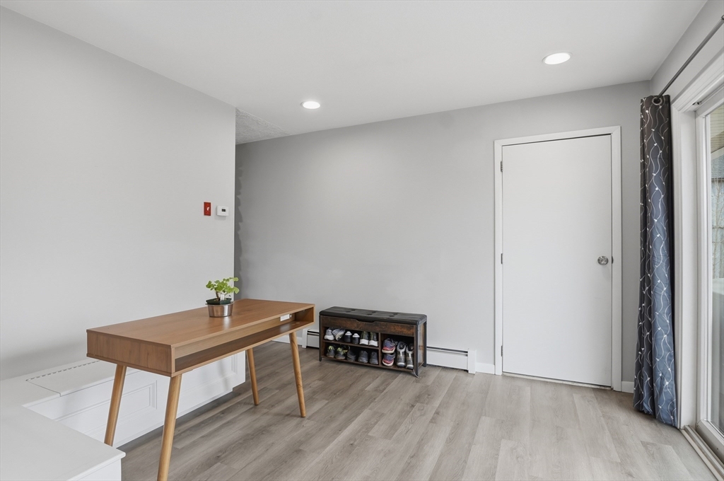 185 Davis Road Westminster, MA 01473 - Photo 13 of 36 a view of a room with chairs and wooden floor
