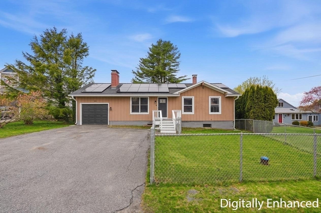 185 Davis Road Westminster, MA 01473 - Photo 26 of 36 a front view of a house with a yard and garage