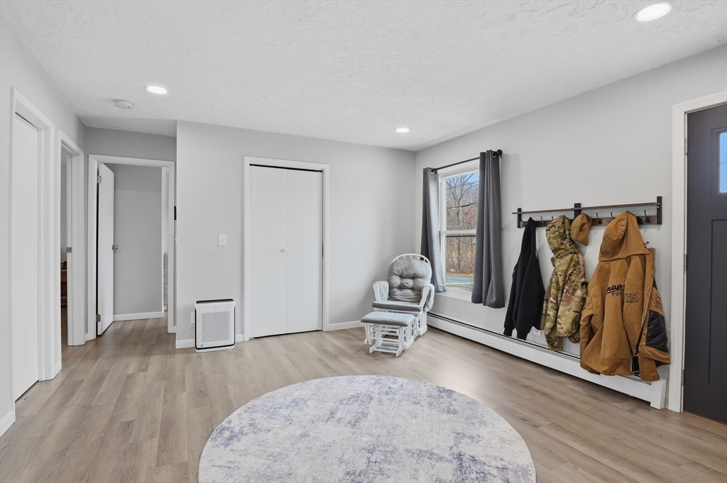 185 Davis Road Westminster, MA 01473 - Photo 10 of 36 a view of a livingroom with wooden floor