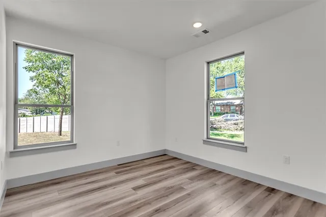 an empty room with windows