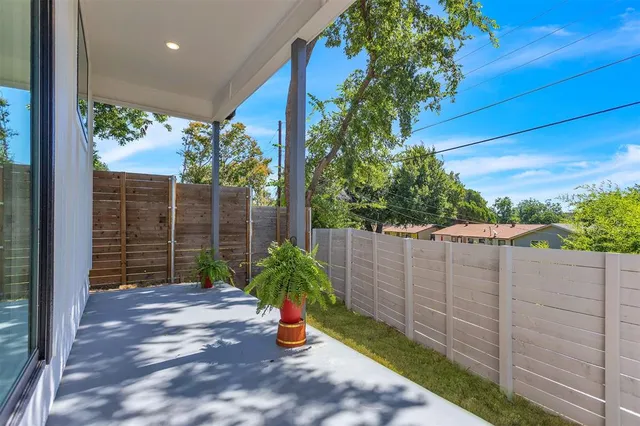 a view of a backyard with plants