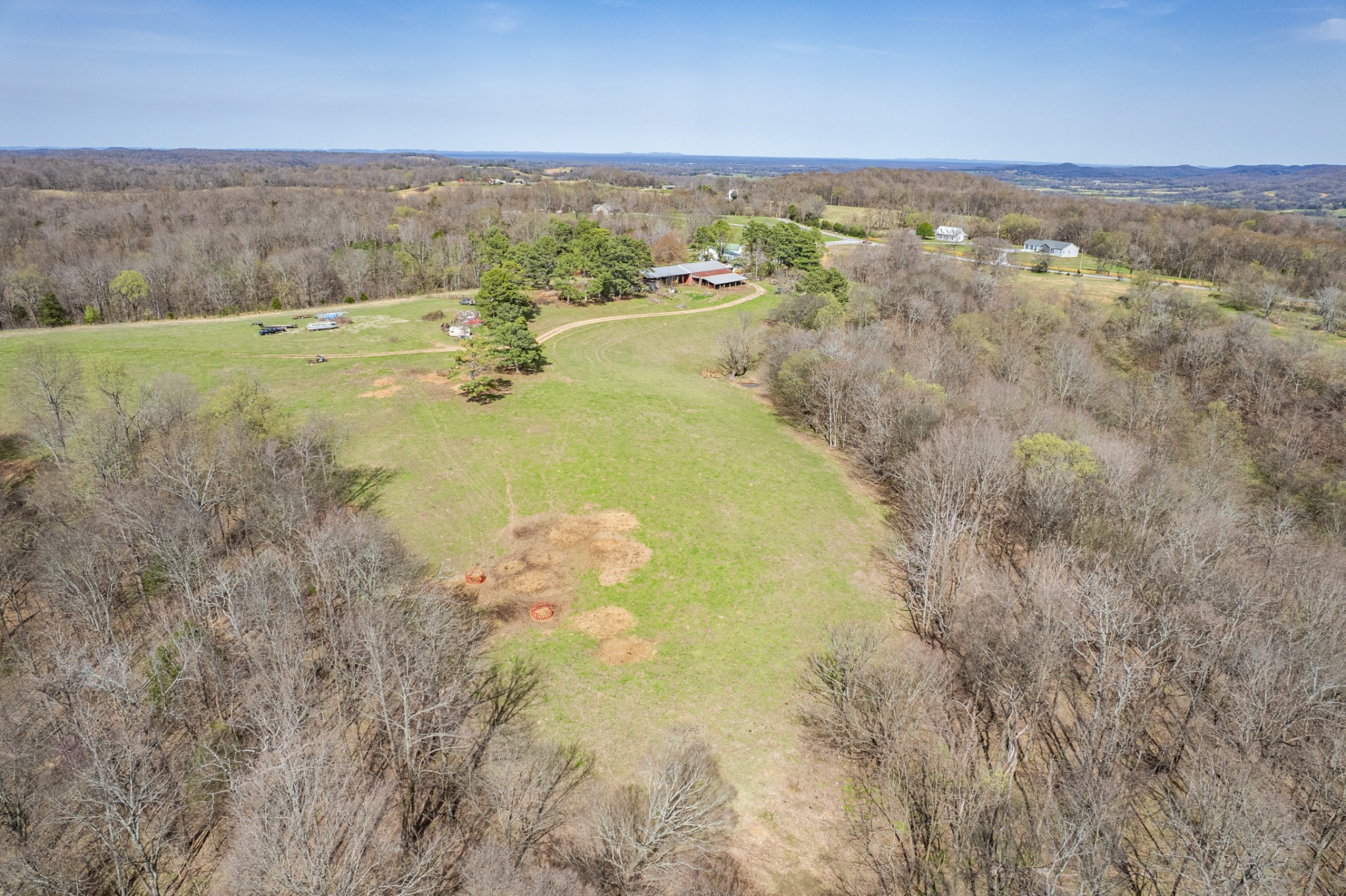 2675 Red Nix Road Cornersville, TN 37047 - Photo 20 of 52 a view of a lake in middle of a field