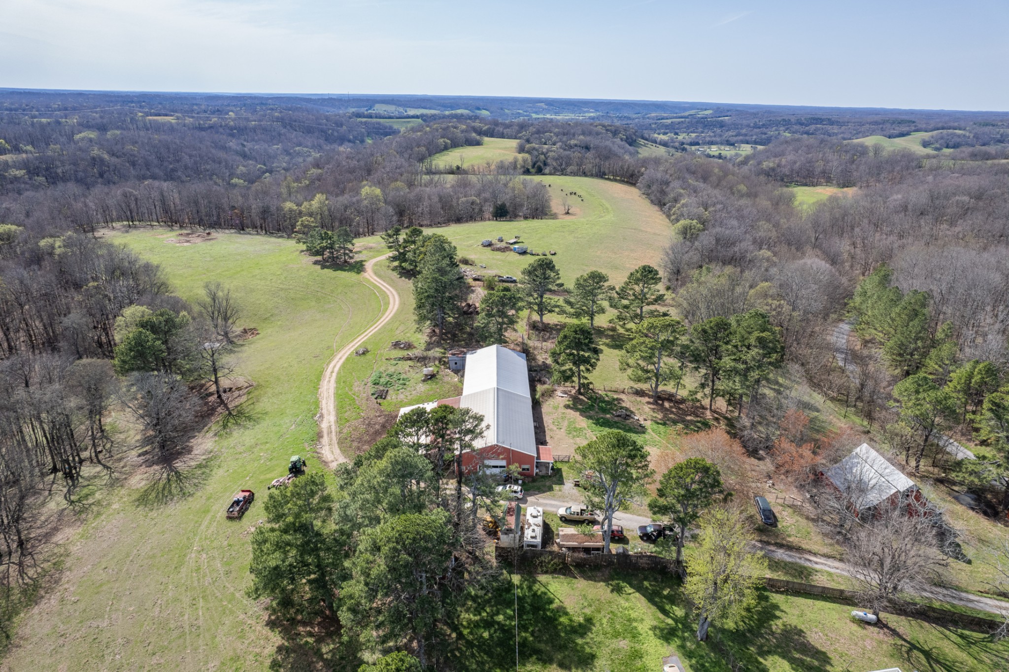 2675 Red Nix Road Cornersville, TN 37047 - Photo 24 of 52 an aerial view of a house with a lake view