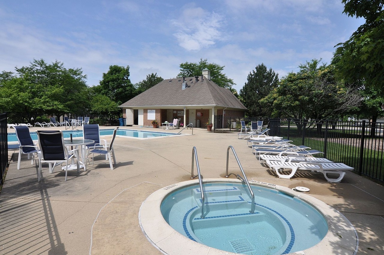 2891 Belle Lane, Unit 2891 Schaumburg, IL 60193 - Photo 22 of 25 a view of a swimming pool with a patio