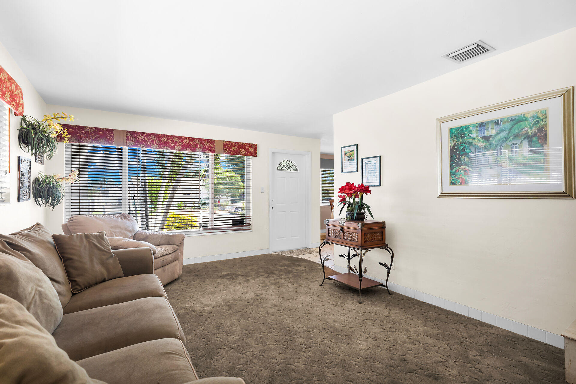 1014 17th Terrace Key West, FL 33040 - Photo 19 of 32 a living room with furniture and a large window