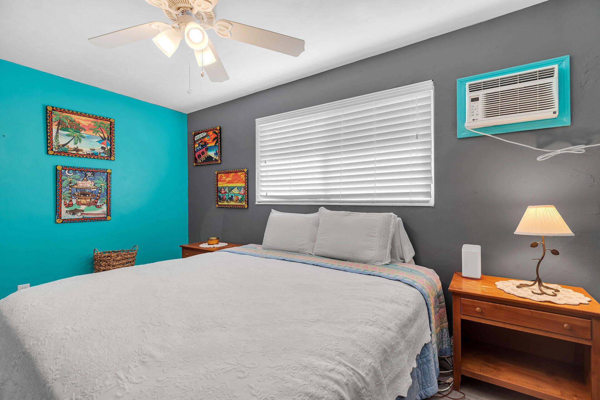 1014 17th Terrace Key West, FL 33040 - Photo 26 of 32 a bedroom with a bed and a lamp on dresser