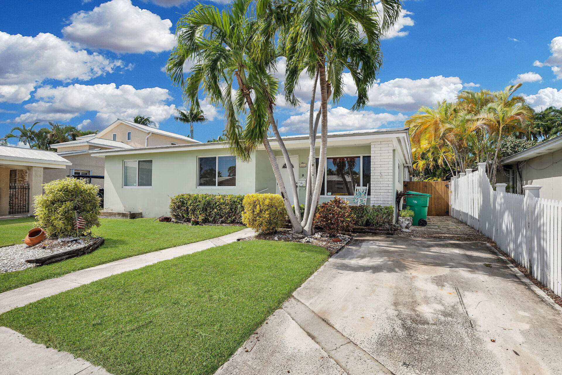 1014 17th Terrace Key West, FL 33040 - Photo 3 of 32 a view of a house with a yard and potted plants