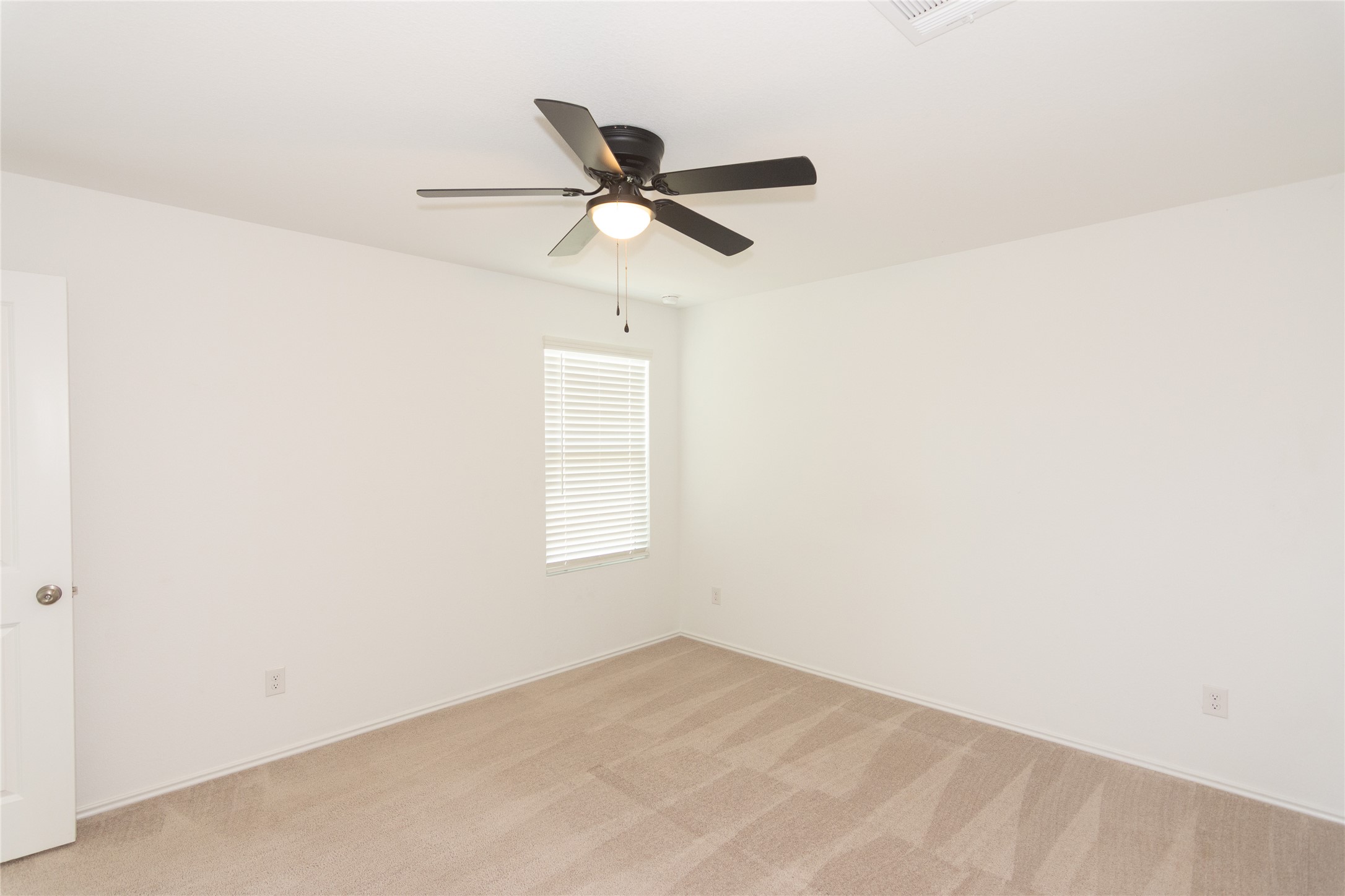 544 Rancho Del Cielo Loop Jarrell, TX 76537 - Photo 15 of 39 Unfurnished room featuring light colored carpet and ceiling fan