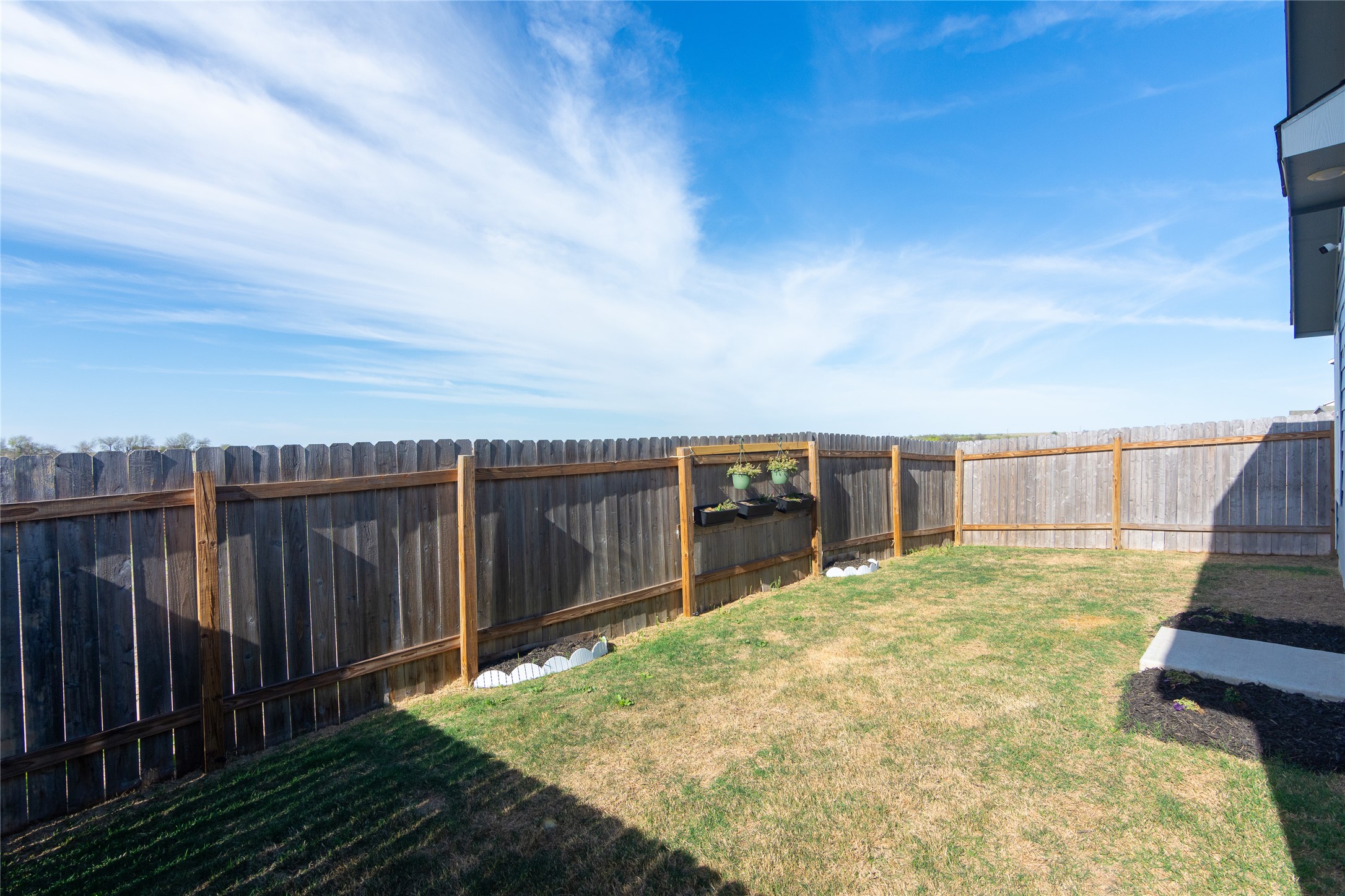 544 Rancho Del Cielo Loop Jarrell, TX 76537 - Photo 28 of 39 View of fenced backyard