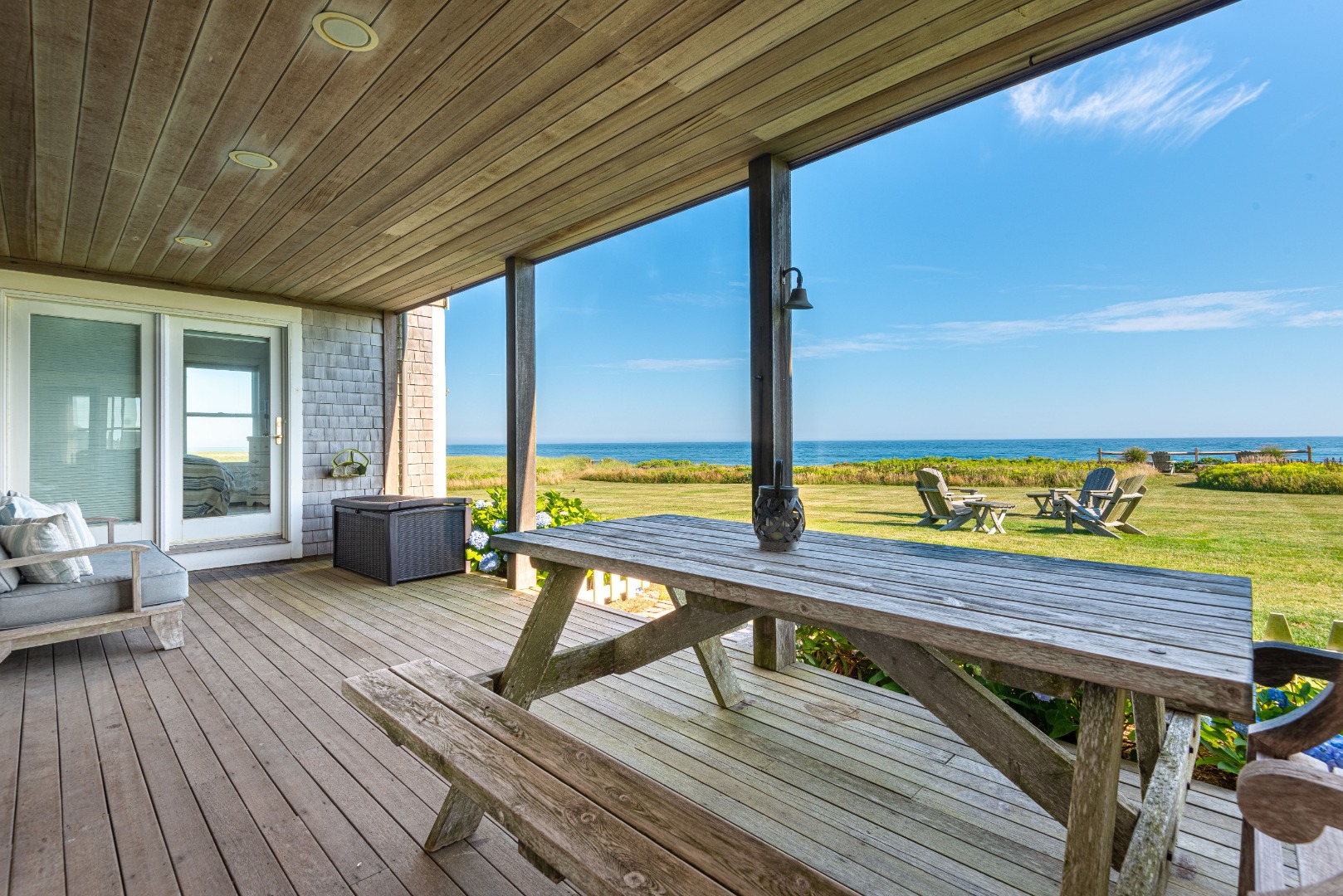 56 R Madequecham Valley Road Nantucket, MA 02554 - Photo 27 of 52 a view of a balcony with chair and wooden floor