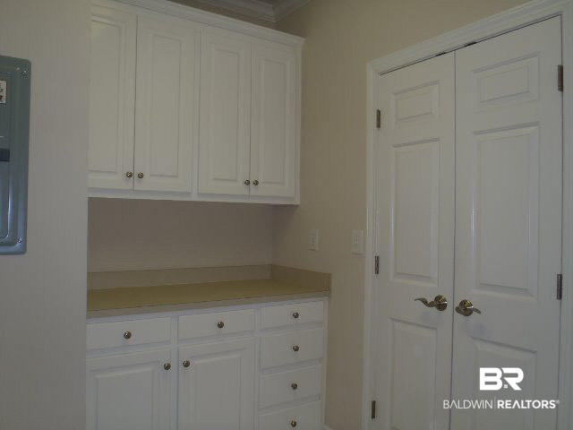 107 Chestnut Ridge Fairhope, AL 36532 - Photo 12 of 20 Laundry has upper and lower cabinet space and has a door into the master bedroom