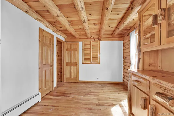 a view of a room with windows