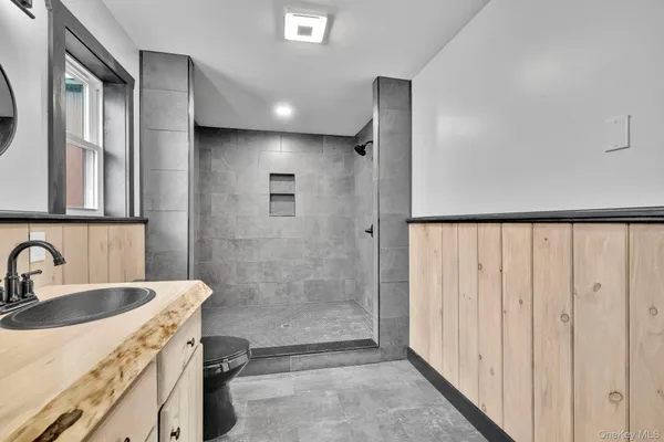 a bathroom with a sink and a shower