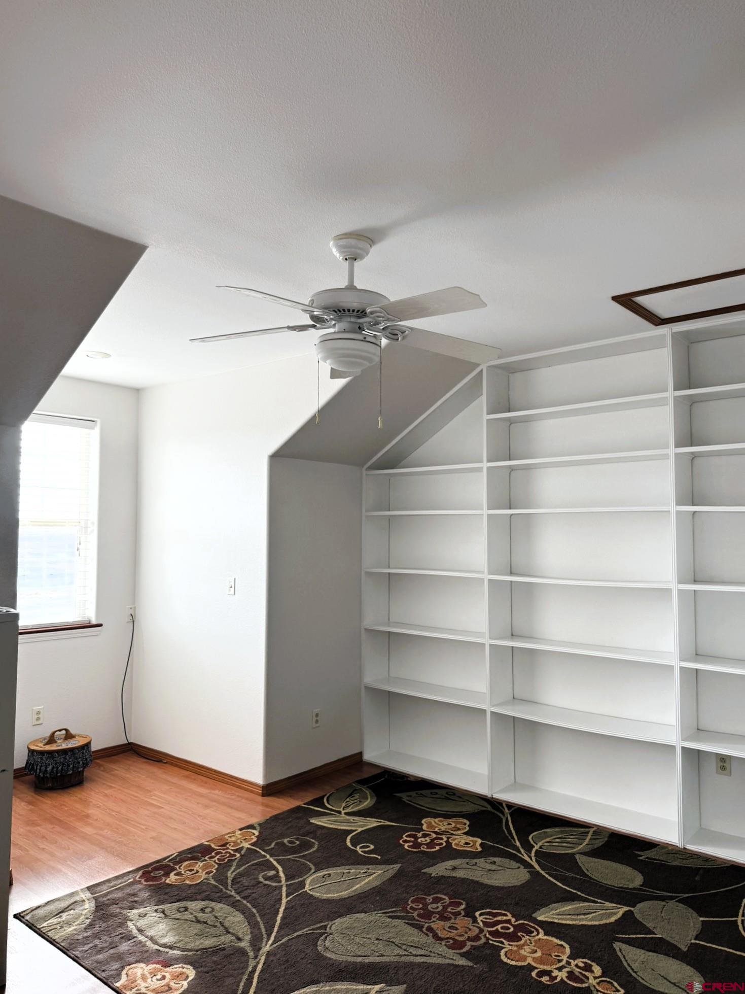1552 Southwest Painted Fork Road Cedaredge, CO 81413 - Photo 14 of 45 a room with furniture and a window