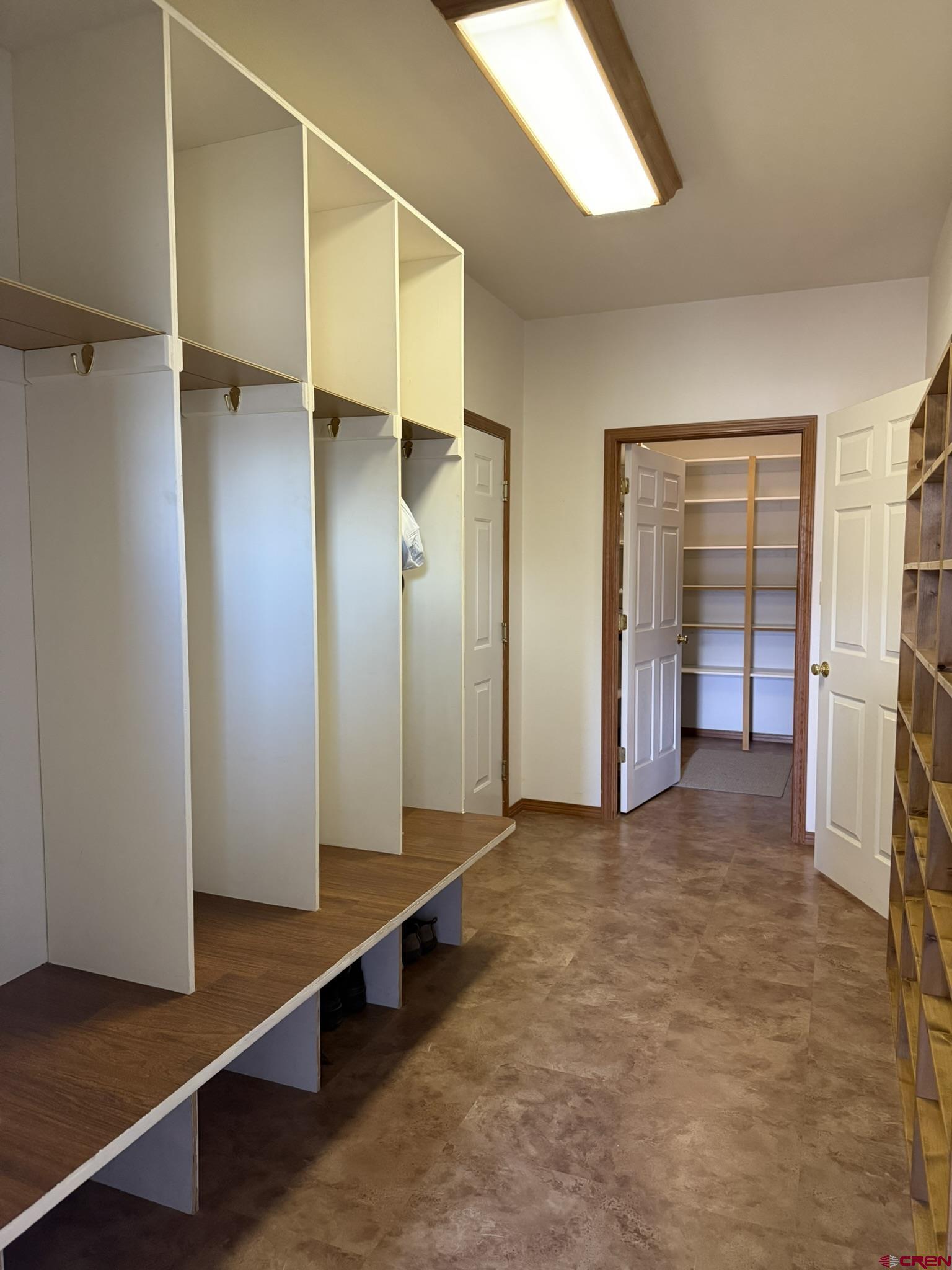 1552 Southwest Painted Fork Road Cedaredge, CO 81413 - Photo 20 of 45 a view of entryway with wooden floor