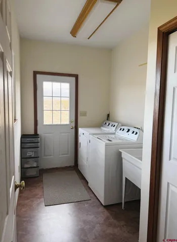 a living room with furniture and windows
