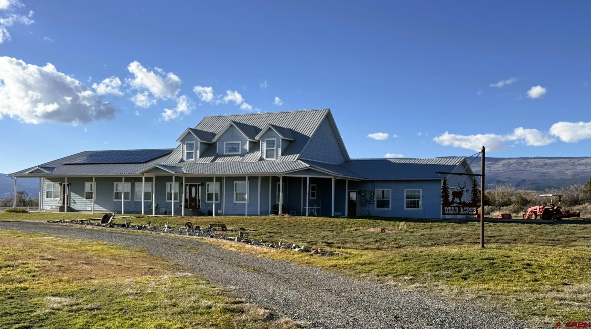 1552 Southwest Painted Fork Road Cedaredge, CO 81413 - Photo 32 of 45 a front view of a building with street view