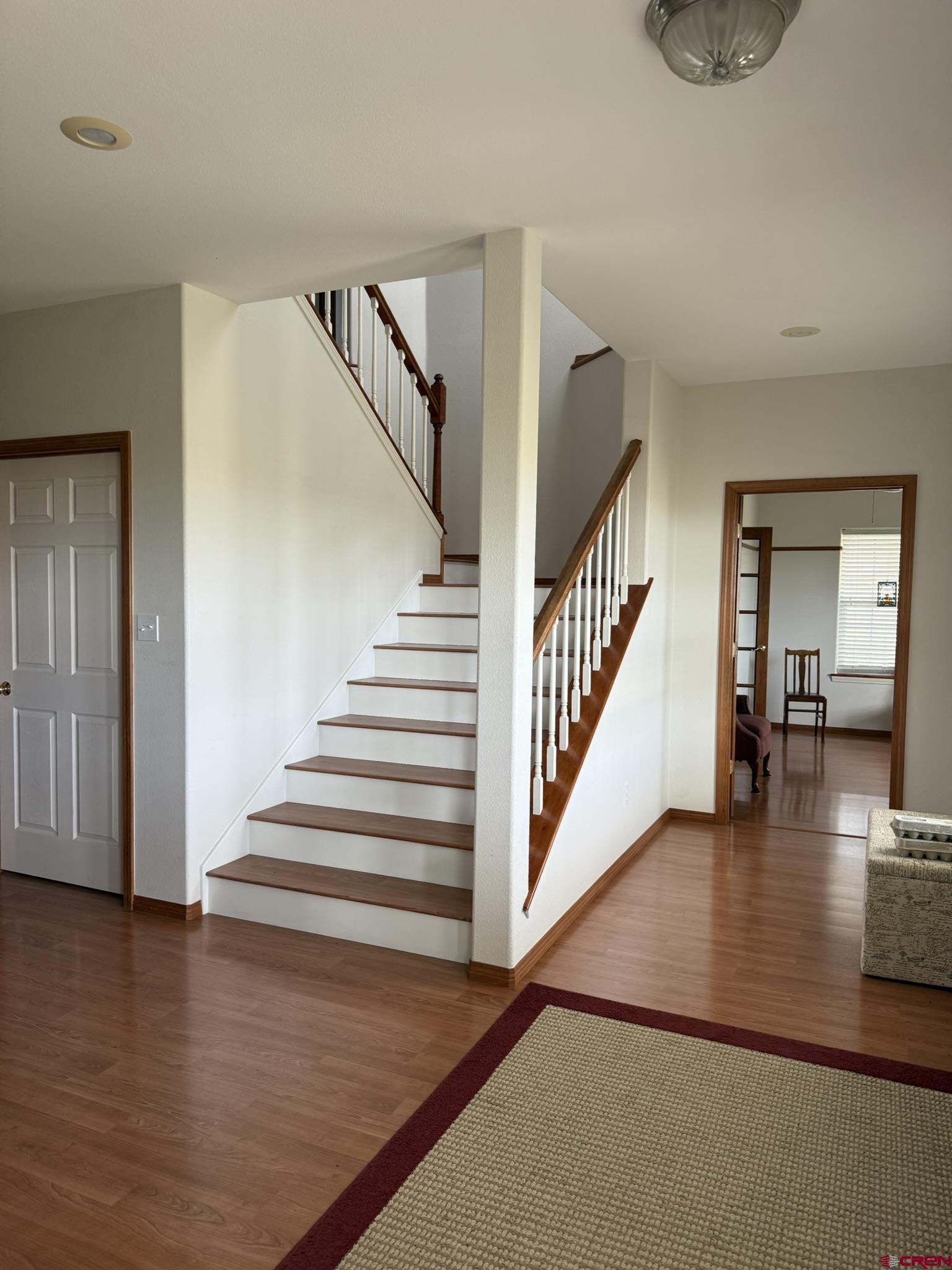 1552 Southwest Painted Fork Road Cedaredge, CO 81413 - Photo 6 of 45 a view of entryway and hall with wooden floor