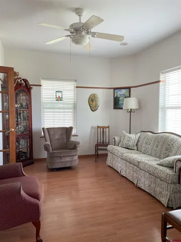 a large kitchen with stainless steel appliances granite countertop a stove and a refrigerator