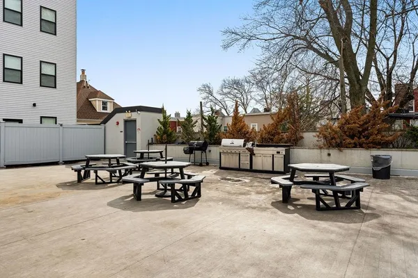a view of a terrace with sitting area