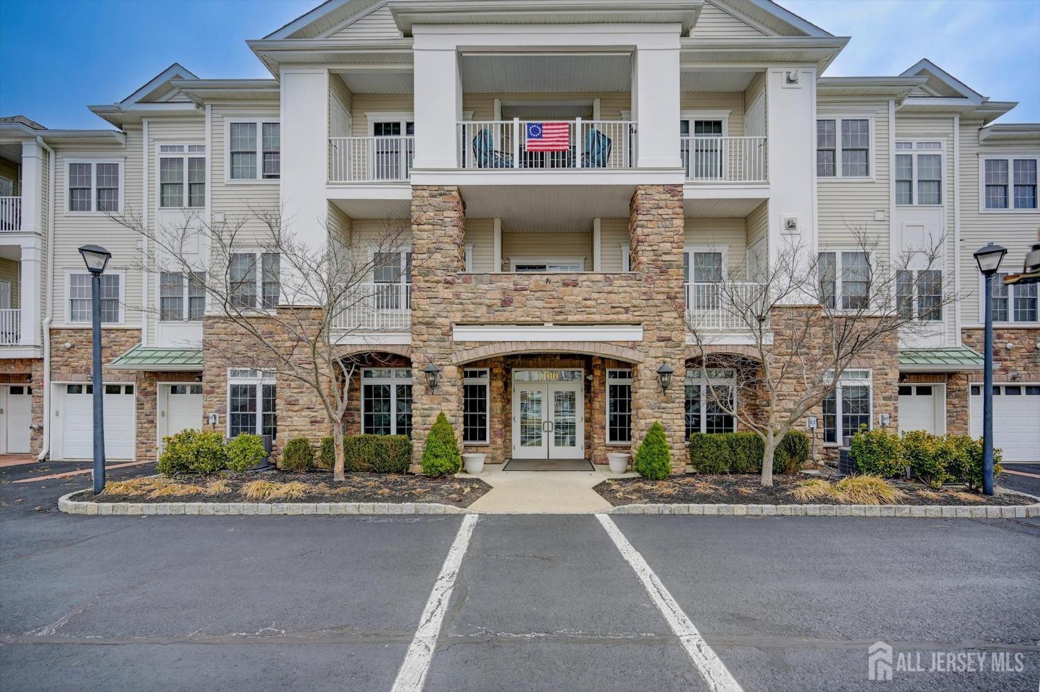 a front view of a building with a street