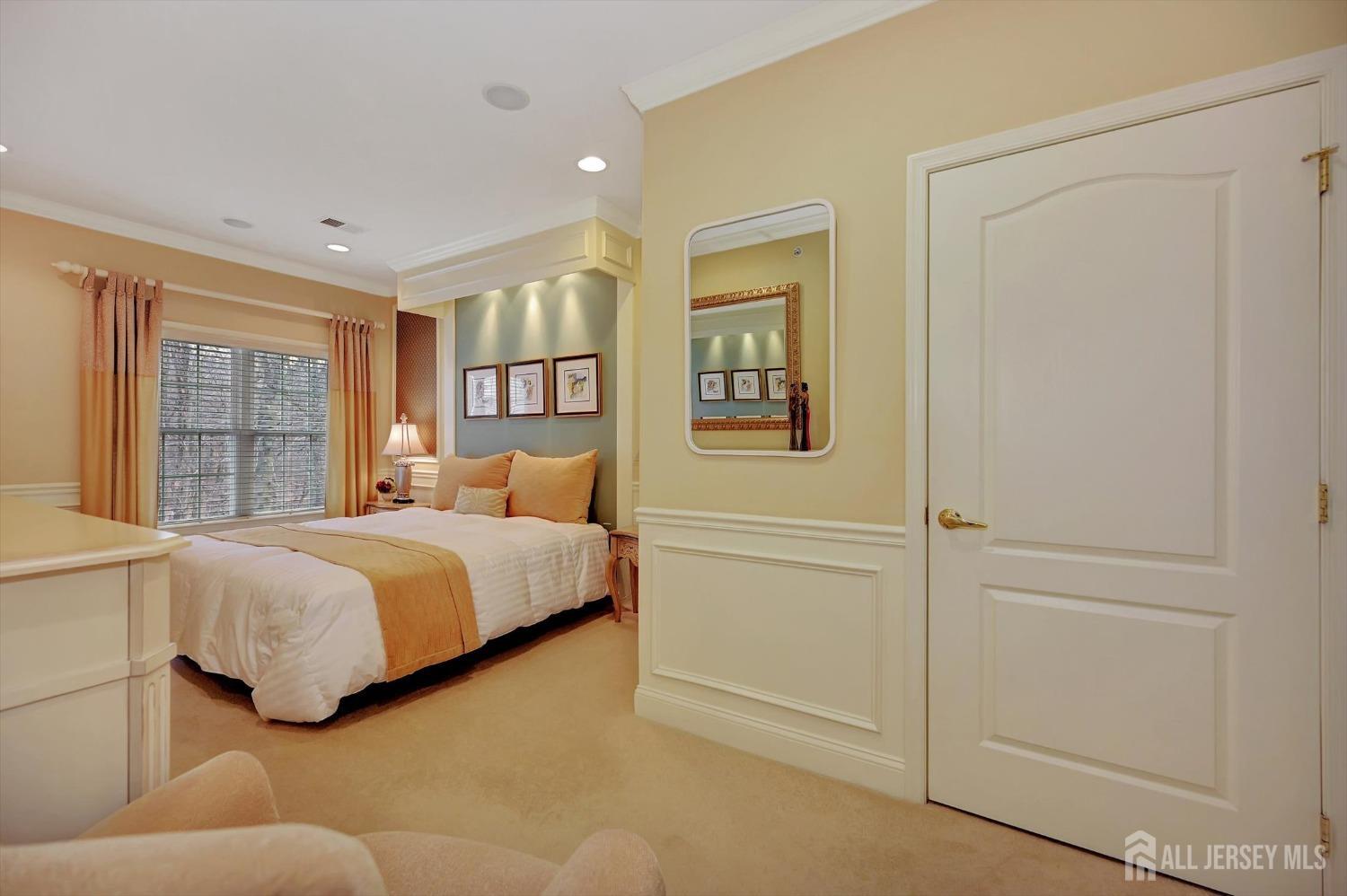 1322 Falston Circle Old Bridge, NJ 08857 - Photo 13 of 38 a spacious bedroom with a bed and glass window