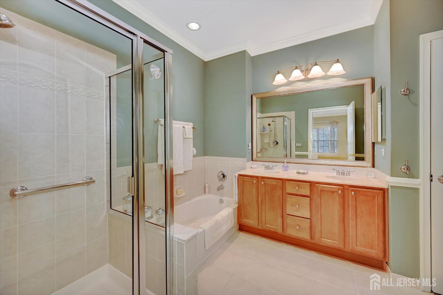 1322 Falston Circle Old Bridge, NJ 08857 - Photo 18 of 38 a spacious bathroom with a double vanity sink and a mirror