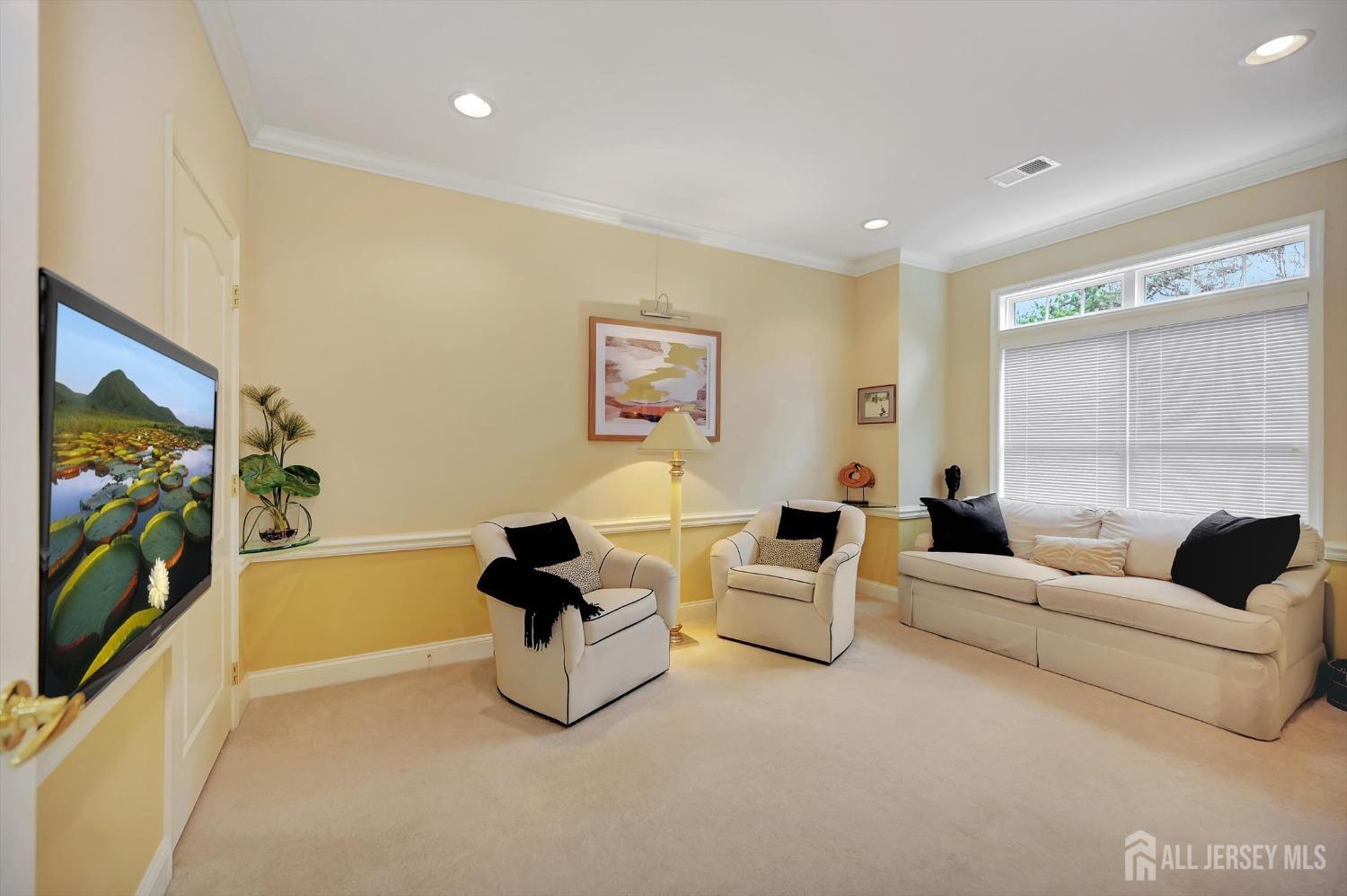 1322 Falston Circle Old Bridge, NJ 08857 - Photo 20 of 38 a living room with furniture and a flat screen tv