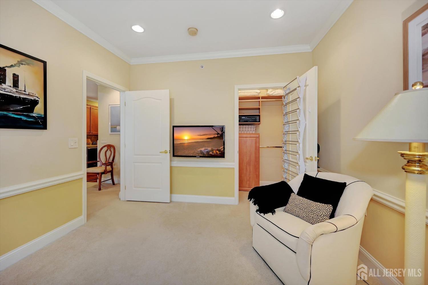 1322 Falston Circle Old Bridge, NJ 08857 - Photo 21 of 38 a living room with a flat screen tv furniture and a flat screen tv
