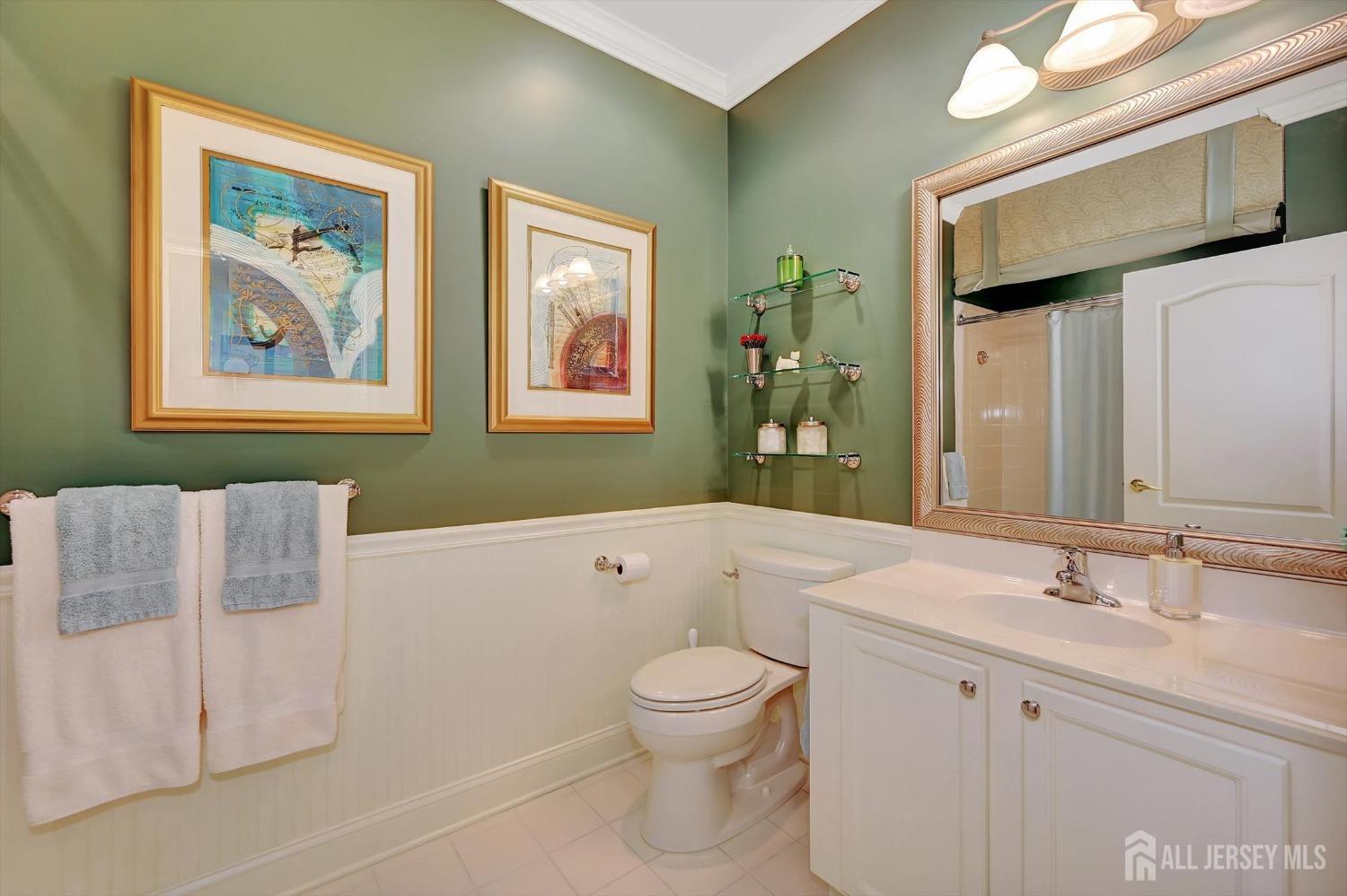 1322 Falston Circle Old Bridge, NJ 08857 - Photo 24 of 38 a bathroom with a toilet sink and mirror