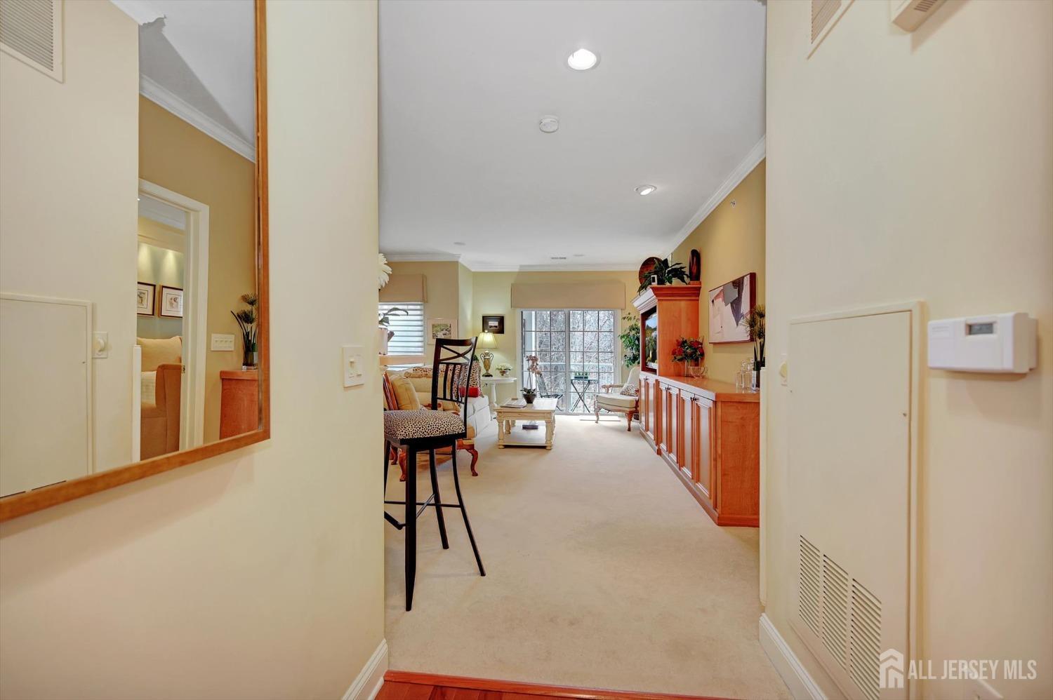 1322 Falston Circle Old Bridge, NJ 08857 - Photo 3 of 38 a living room with furniture and a book shelf