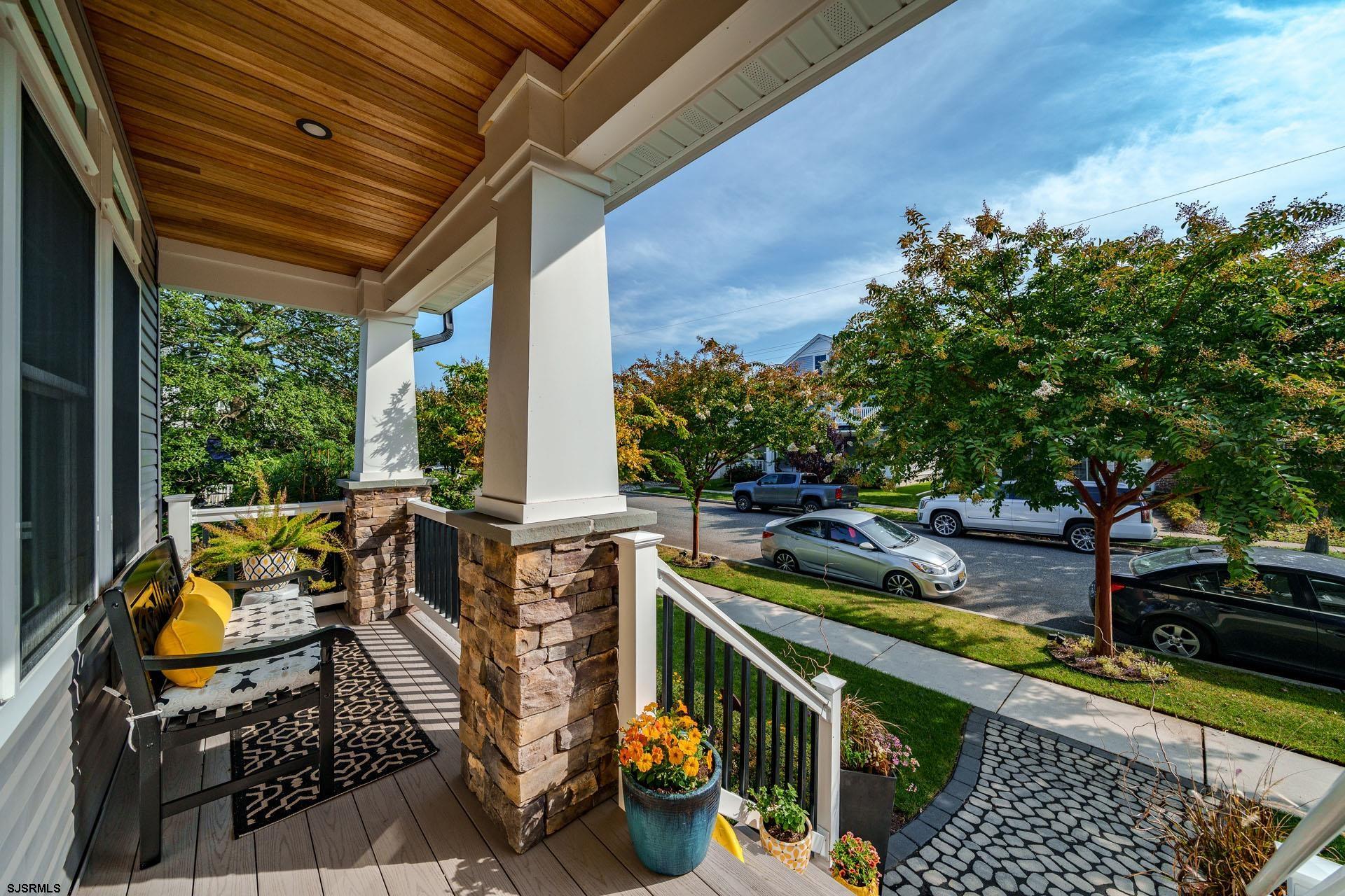 230 West Seaspray Road Ocean City, NJ 08226 - Photo 2 of 45 a city view from a balcony with chairs