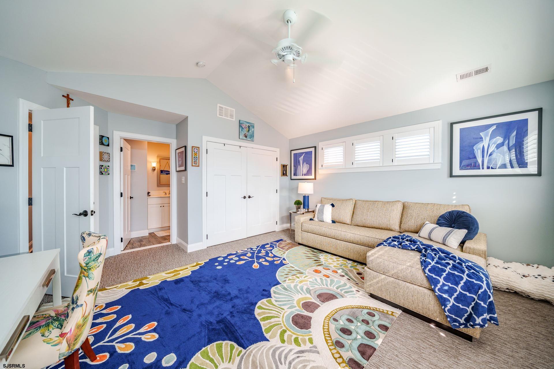 230 West Seaspray Road Ocean City, NJ 08226 - Photo 22 of 45 a living room with furniture and a couch