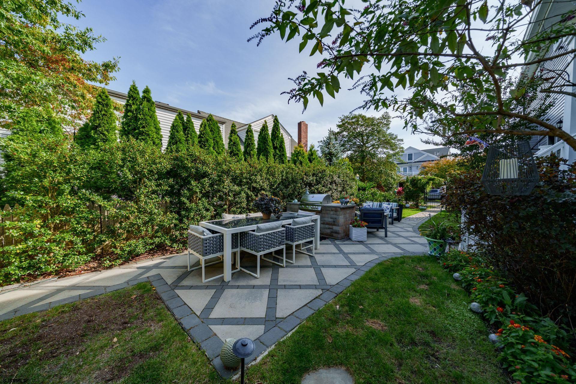 230 West Seaspray Road Ocean City, NJ 08226 - Photo 28 of 45 a view of a backyard with sitting area