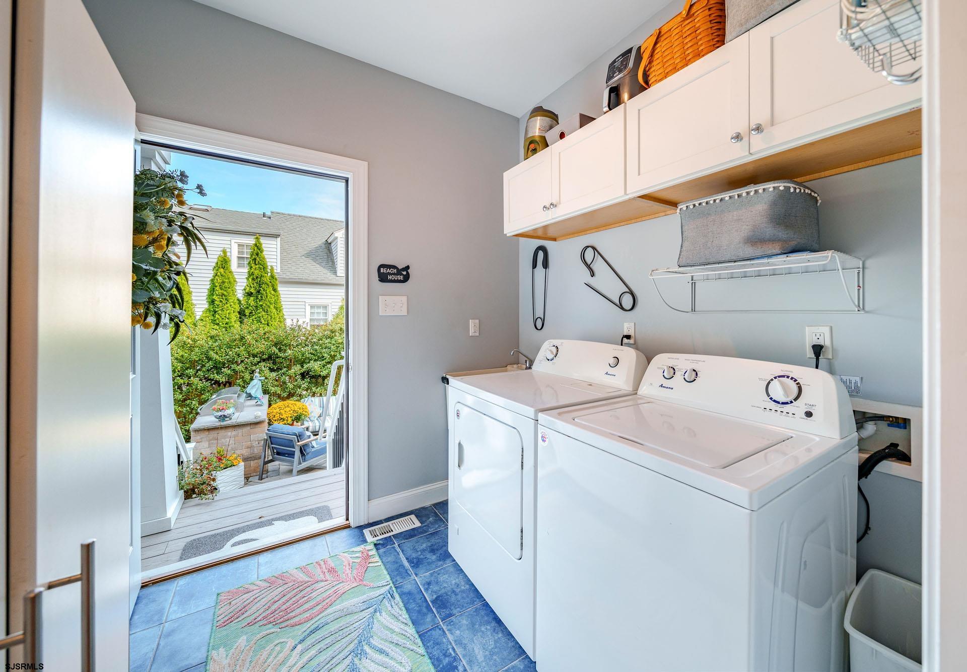 230 West Seaspray Road Ocean City, NJ 08226 - Photo 10 of 45 a utility room with dryer and washer